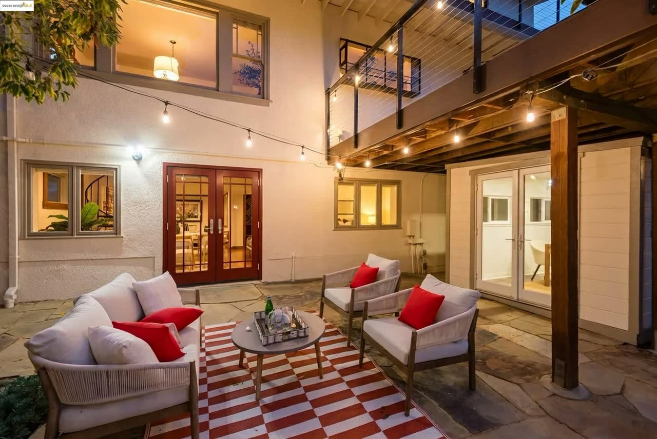 The courtyard, strung with lights for an evening outside.